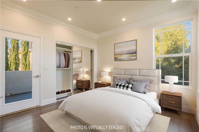 bedroom with crown molding, multiple windows, recessed lighting, access to exterior, and hardwood / wood-style flooring