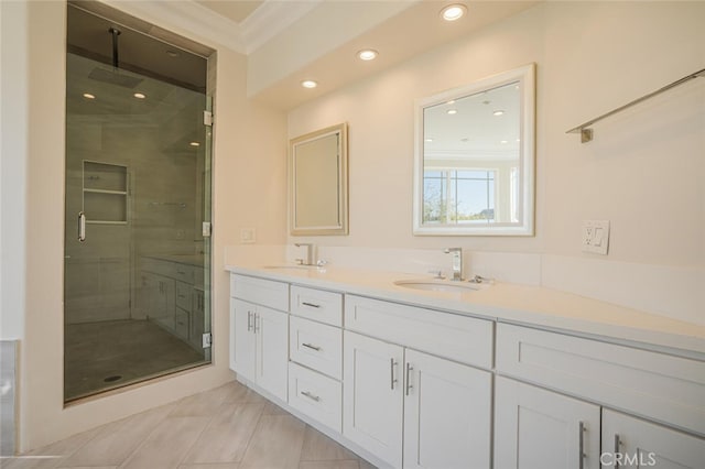 bathroom featuring a stall shower, recessed lighting, double vanity, ornamental molding, and tile patterned flooring