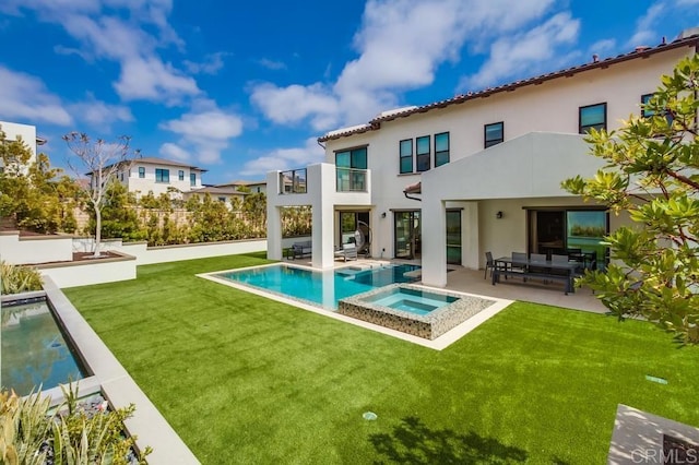 6222 Artisan Way, San Diego, CA 92130 - back of house featuring a pool with connected hot tub, a patio area, a balcony, a yard, and stucco siding