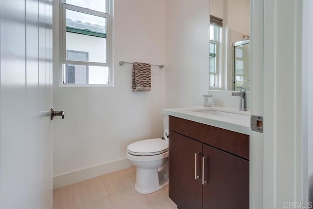 6222 Artisan Way, San Diego, CA 92130 - bathroom featuring an enclosed shower, toilet, a healthy amount of sunlight, and vanity