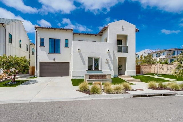 6222 Artisan Way, San Diego, CA 92130 - mediterranean / spanish-style home featuring an attached garage, stucco siding, a balcony, and concrete driveway