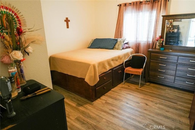 342434241/2 Paloma St, Los Angeles, CA 90011 - bedroom with wood finished floors