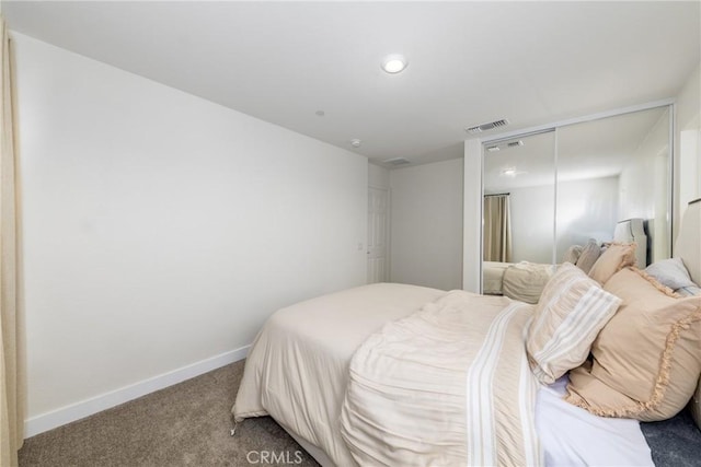 bedroom featuring baseboards, recessed lighting, visible vents, carpet, and a closet