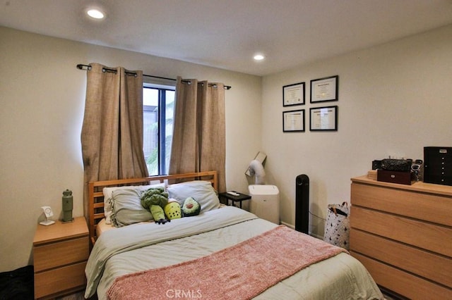 bedroom with recessed lighting