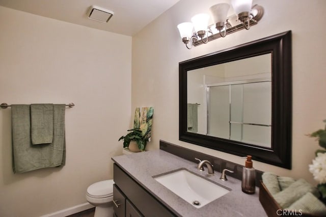 17200 Newhope St Unit 206, Fountain Valley, CA 92708 - bathroom featuring vanity, a shower with door, and a chandelier