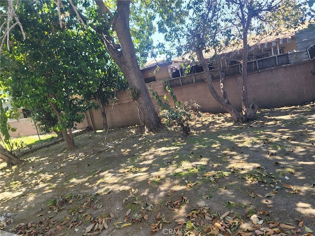 6221 Fishburn Ave, Bell, CA 90201 - view of yard featuring a fenced backyard