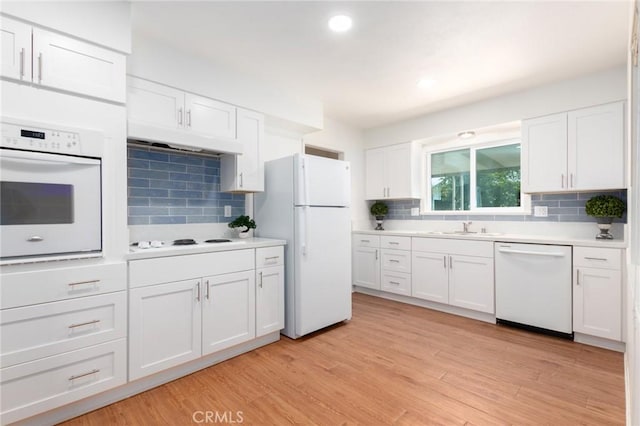 28590 Middlebury Way, Menifee, CA 92586 - kitchen featuring white appliances, a sink, tasteful backsplash, white cabinets, and light countertops