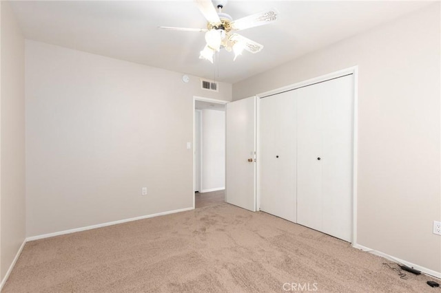 28590 Middlebury Way, Menifee, CA 92586 - unfurnished bedroom with carpet, a closet, baseboards, and ceiling fan