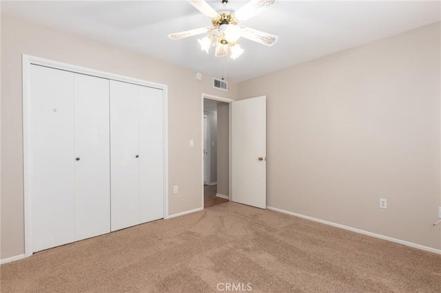 28590 Middlebury Way, Menifee, CA 92586 - unfurnished bedroom with light colored carpet, baseboards, a closet, and ceiling fan