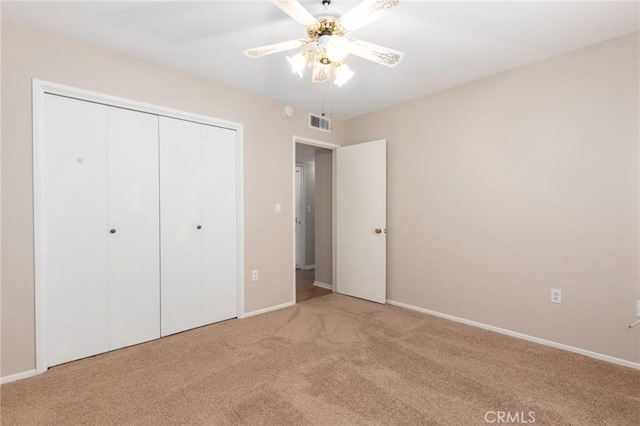 28590 Middlebury Way, Menifee, CA 92586 - unfurnished bedroom with light carpet, baseboards, a closet, and a ceiling fan