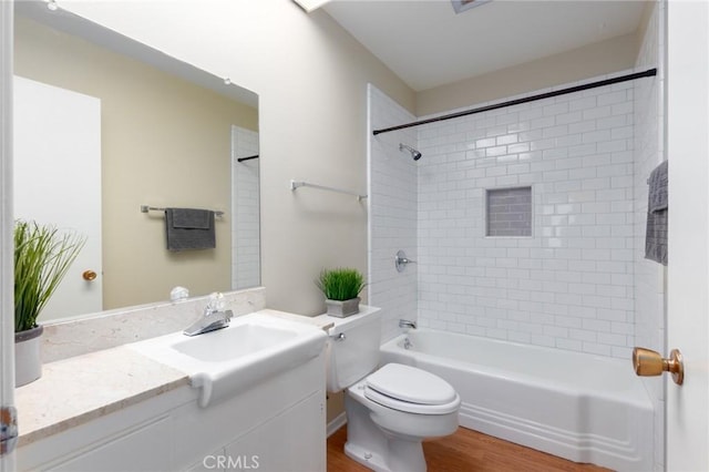 28590 Middlebury Way, Menifee, CA 92586 - bathroom featuring wood finished floors, toilet, vanity, and tub / shower combination