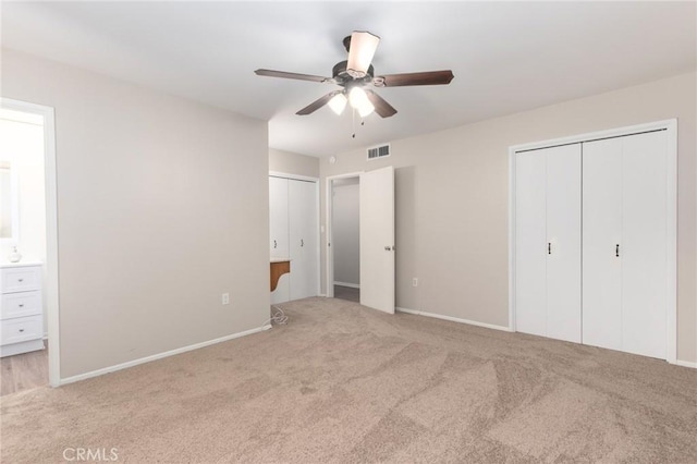 28590 Middlebury Way, Menifee, CA 92586 - unfurnished bedroom with two closets, carpet, ensuite bathroom, and baseboards