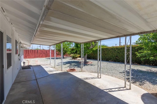 28590 Middlebury Way, Menifee, CA 92586 - view of patio with a fenced backyard and a carport