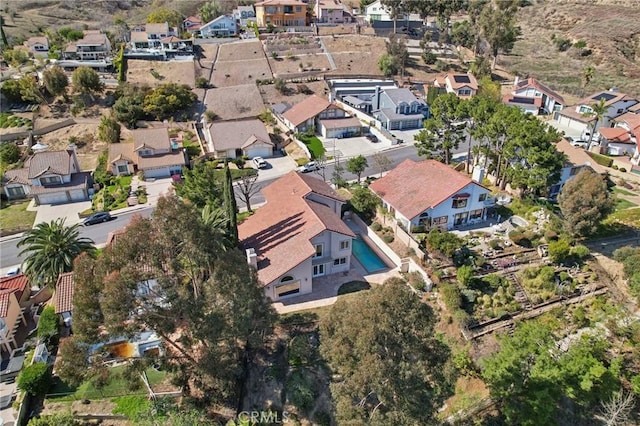 birds eye view of property with a residential view