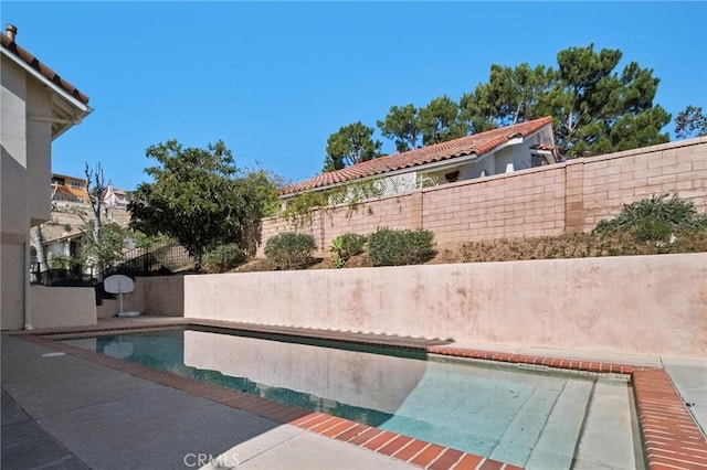 view of pool with a fenced backyard and a fenced in pool