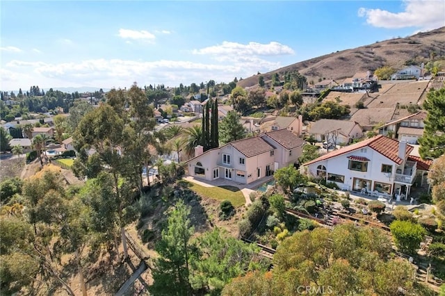 drone / aerial view with a mountain view and a residential view