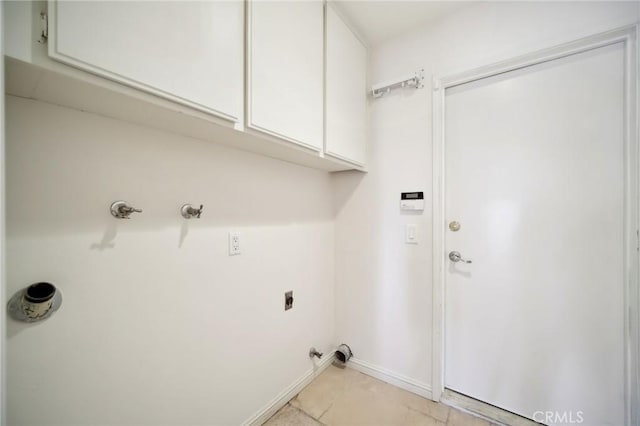 clothes washing area with light tile patterned flooring, baseboards, hookup for a washing machine, cabinet space, and electric dryer hookup