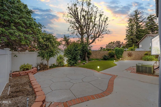 2752 Lemon Dr, Simi Valley, CA 93063 - patio terrace at dusk featuring a patio and a fenced backyard