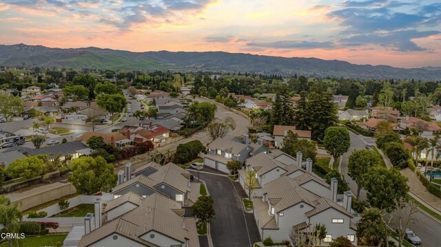 2752 Lemon Dr, Simi Valley, CA 93063 - aerial overview of property's location featuring a mountainous background and nearby suburban area