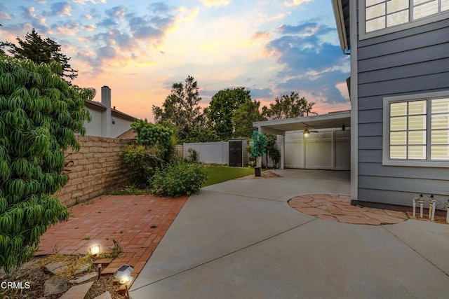 2752 Lemon Dr, Simi Valley, CA 93063 - patio terrace at dusk featuring a fenced backyard and a patio area