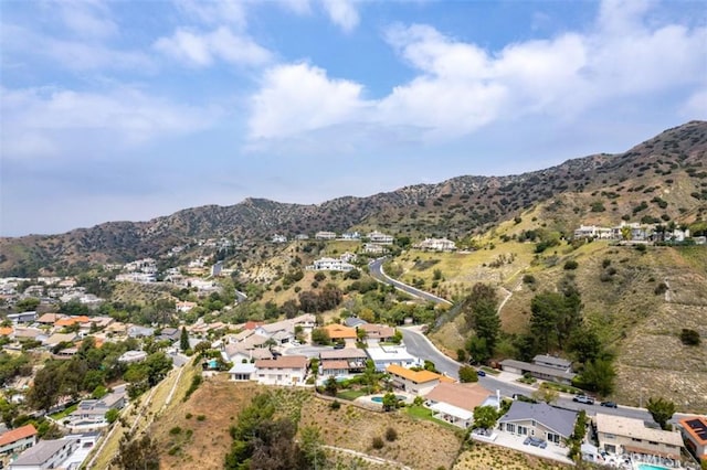bird's eye view featuring a residential view and a mountain view