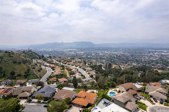 bird's eye view featuring a residential view and a mountain view
