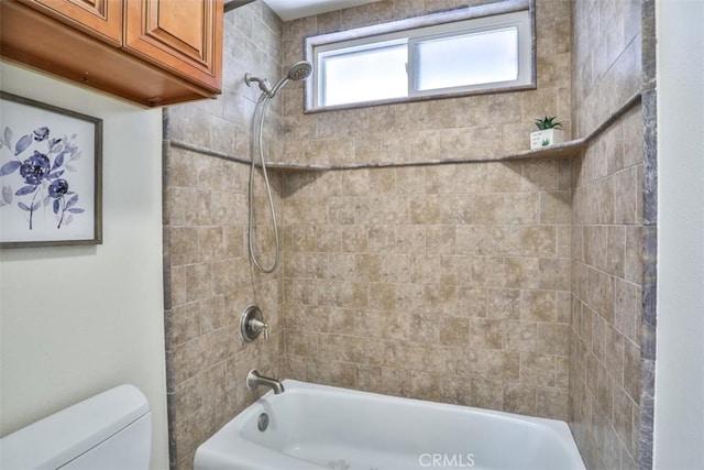 full bath with toilet and shower / bath combination