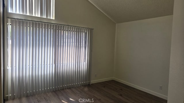 13104 Glen Ct Unit 46, Chino Hills, CA 91709 - spare room with baseboards, wood finished floors, and lofted ceiling