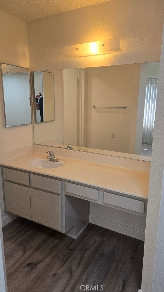 13104 Glen Ct Unit 46, Chino Hills, CA 91709 - bathroom with vanity and wood finished floors