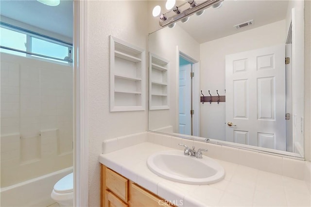 full bathroom with shower / bathtub combination, visible vents, toilet, and vanity