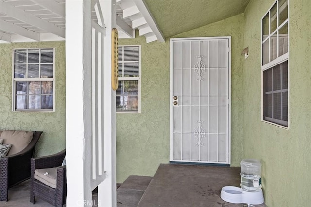 3432 N Arrowhead Ave, San Bernardino, CA 92405 - doorway to property with stucco siding