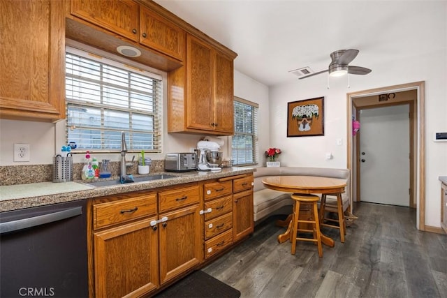 3432 N Arrowhead Ave, San Bernardino, CA 92405 - kitchen with dishwasher, a sink, brown cabinets, dark wood-style flooring, and a ceiling fan