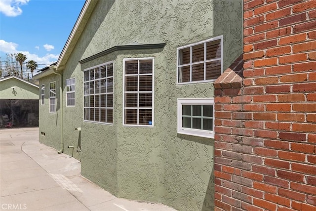 3432 N Arrowhead Ave, San Bernardino, CA 92405 - view of property exterior with stucco siding