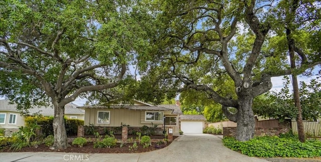 6833 Sultana Ave, San Gabriel, CA 91775 - view of front of property featuring driveway, a chimney, and brick siding