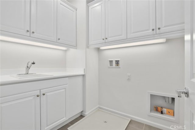 676 E Desert Willow Rd, Azusa, CA 91702 - laundry room featuring hookup for a washing machine, a sink, light tile patterned floors, cabinet space, and baseboards