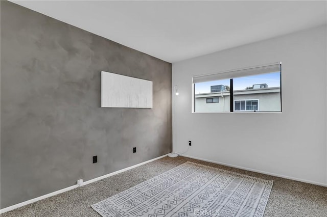 10201 Mason Ave Unit 115, Chatsworth, CA 91311 - carpeted empty room with baseboards