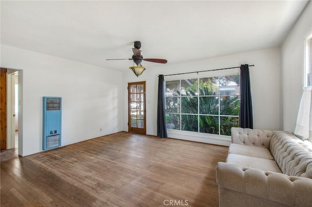 217 N Acacia Ave, Solana Beach, CA 92075 - living area featuring a ceiling fan, a heating unit, and wood finished floors