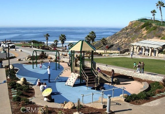 217 N Acacia Ave, Solana Beach, CA 92075 - view of home's community featuring a water view, playground community, and a lawn