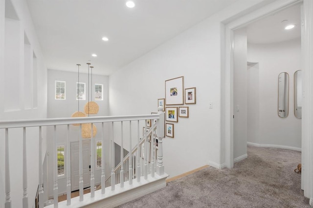 17236 Eagle Canyon Way, San Diego, CA 92127 - corridor featuring carpet floors, an upstairs landing, recessed lighting, healthy amount of natural light, and baseboards