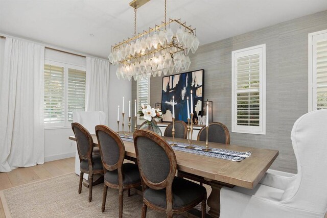 17236 Eagle Canyon Way, San Diego, CA 92127 - dining space featuring wood finished floors, a chandelier, and baseboards