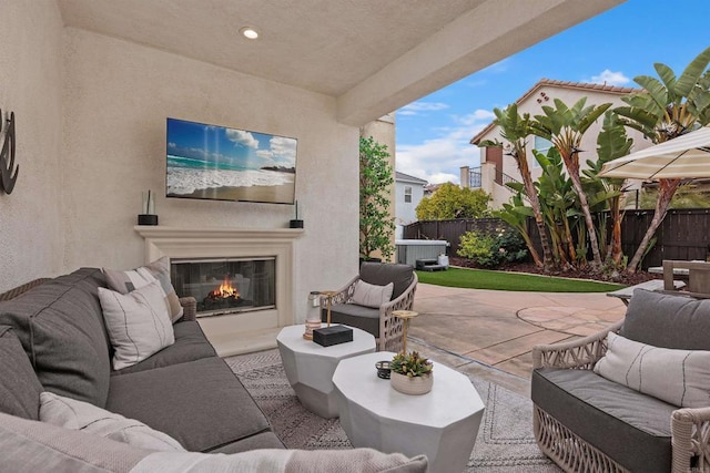 17236 Eagle Canyon Way, San Diego, CA 92127 - view of patio / terrace with an outdoor living space with a fireplace