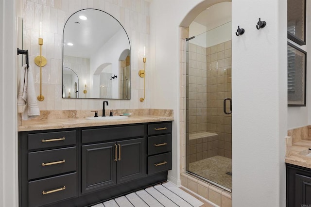 17236 Eagle Canyon Way, San Diego, CA 92127 - full bath with vanity, a stall shower, and decorative backsplash