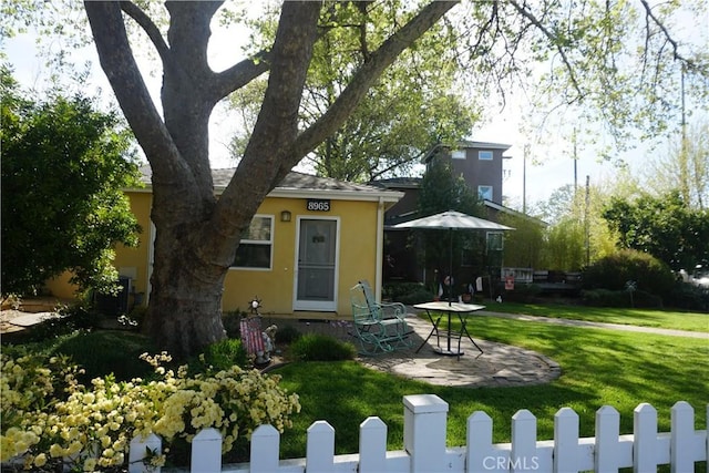 8055 Portola Rd Unit A, Atascadero, CA 93422 - view of front of house featuring stucco siding and a front yard