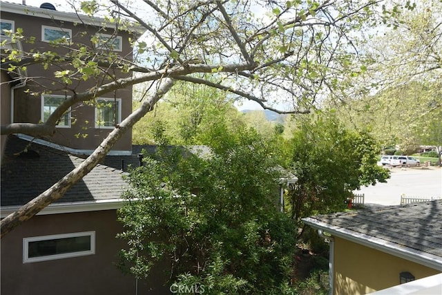 8055 Portola Rd Unit A, Atascadero, CA 93422 - view of side of home with roof with shingles and stucco siding