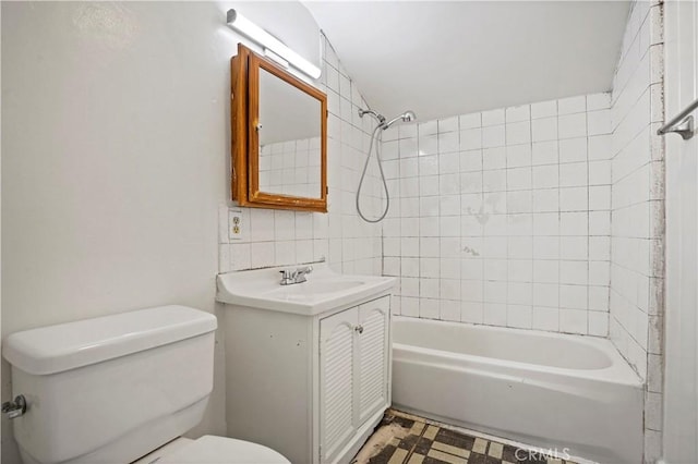 6701 Matilija Ave, Van Nuys, CA 91405 - bathroom featuring toilet, shower / bathtub combination, vanity, and tile walls