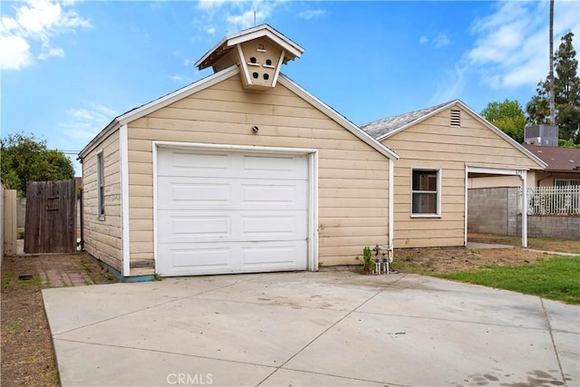 6701 Matilija Ave, Van Nuys, CA 91405 - detached garage featuring fence and concrete driveway
