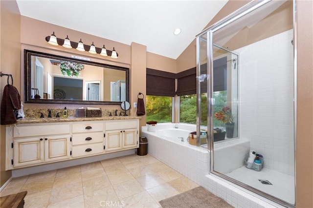 23015 Edenton Pl, Valencia, CA 91354 - full bathroom featuring a bath, a sink, double vanity, vaulted ceiling, and a shower stall