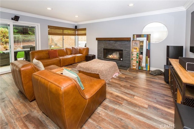 23015 Edenton Pl, Valencia, CA 91354 - living room featuring wood finished floors, a fireplace, recessed lighting, and crown molding