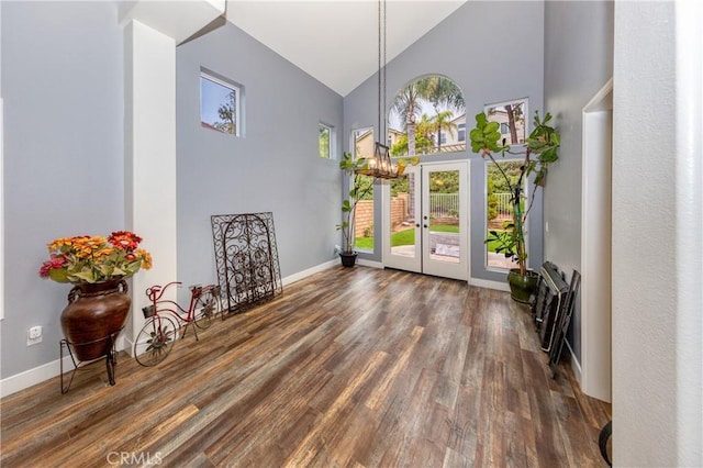 23015 Edenton Pl, Valencia, CA 91354 - foyer with baseboards, wood finished floors, high vaulted ceiling, and a notable chandelier