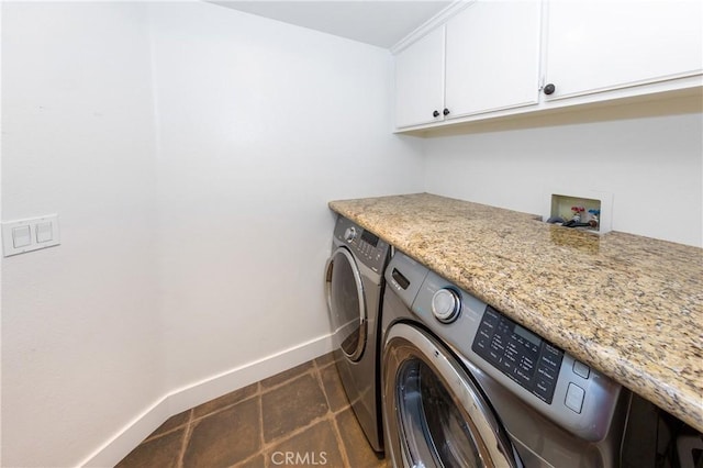 23015 Edenton Pl, Valencia, CA 91354 - washroom with washer and dryer, baseboards, and cabinet space